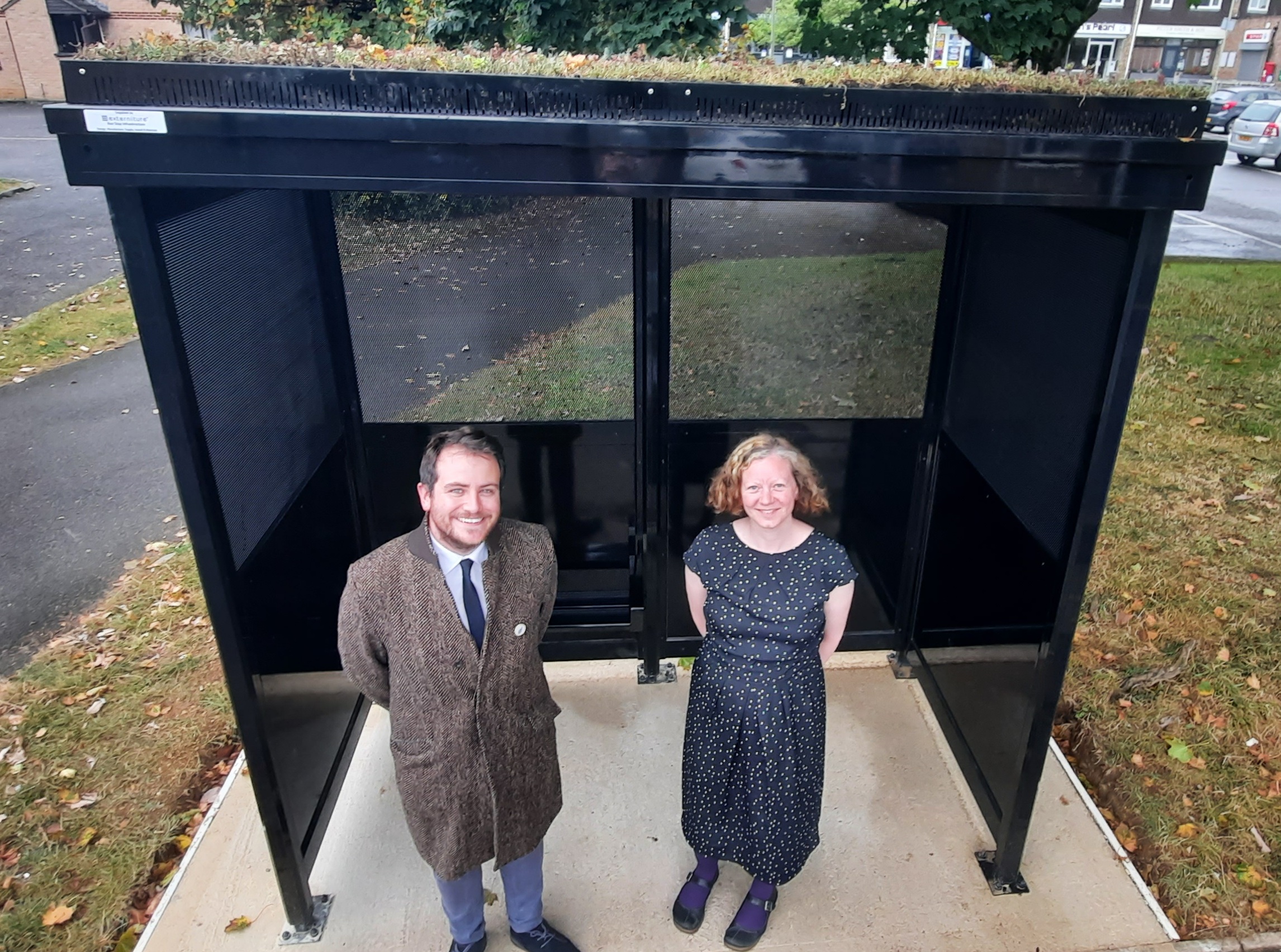 Cllrs Owen Collins and Ruth Smith in the new Living Roof Shelter