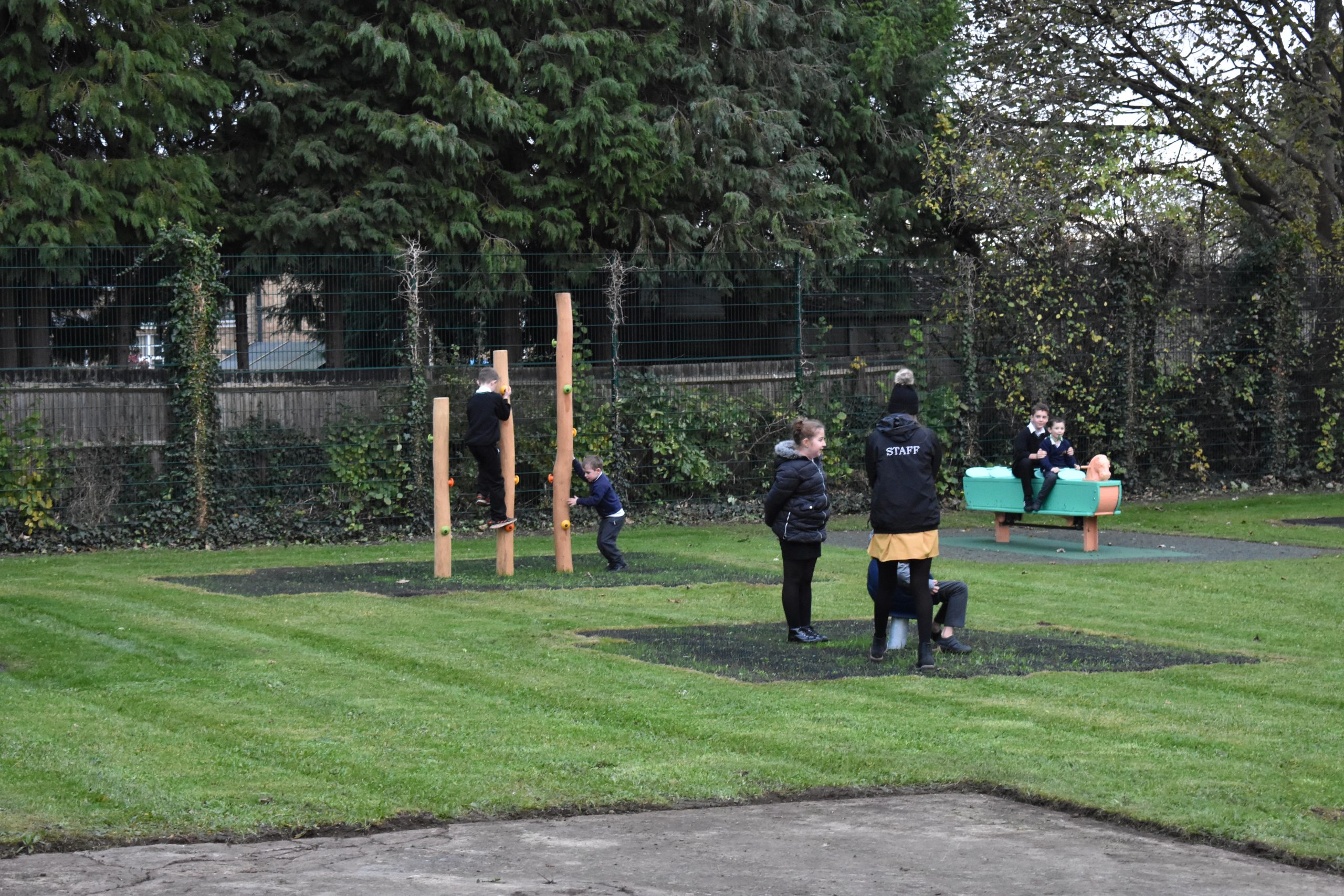 children enjoying the new equipment