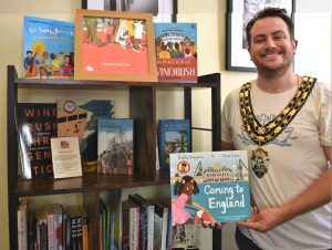 Cllr Owen Collins, Mayor of Witney in the Windrush 75 reading corner