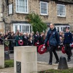 Representatives lay a wreath